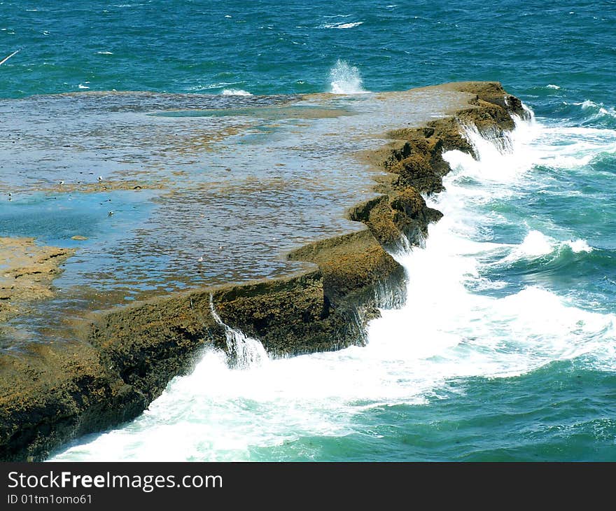 Lonely rock surrounded by the sea, Argentina. Lonely rock surrounded by the sea, Argentina