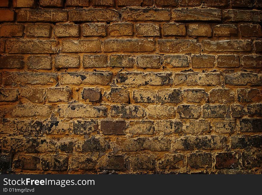 Destroyed old brick wall fragment. Destroyed old brick wall fragment