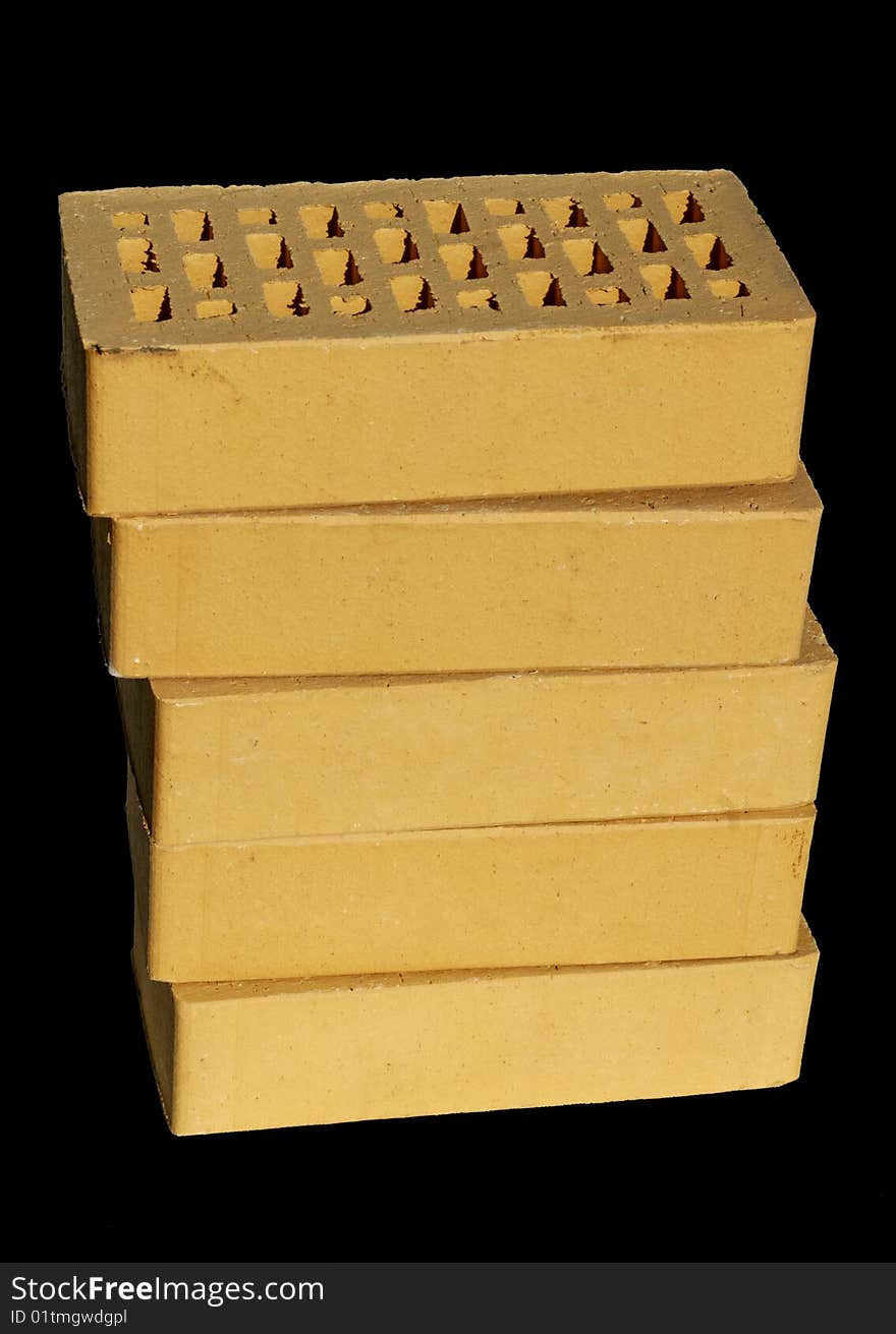 High quality clinker yellow bricks isolated on black. High quality clinker yellow bricks isolated on black