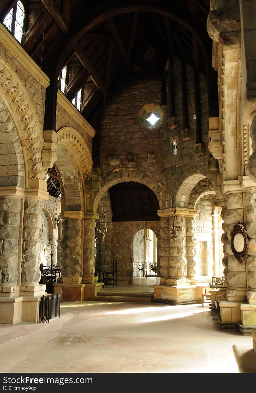 Stone and wood church nave in Romanesque style. Stone and wood church nave in Romanesque style