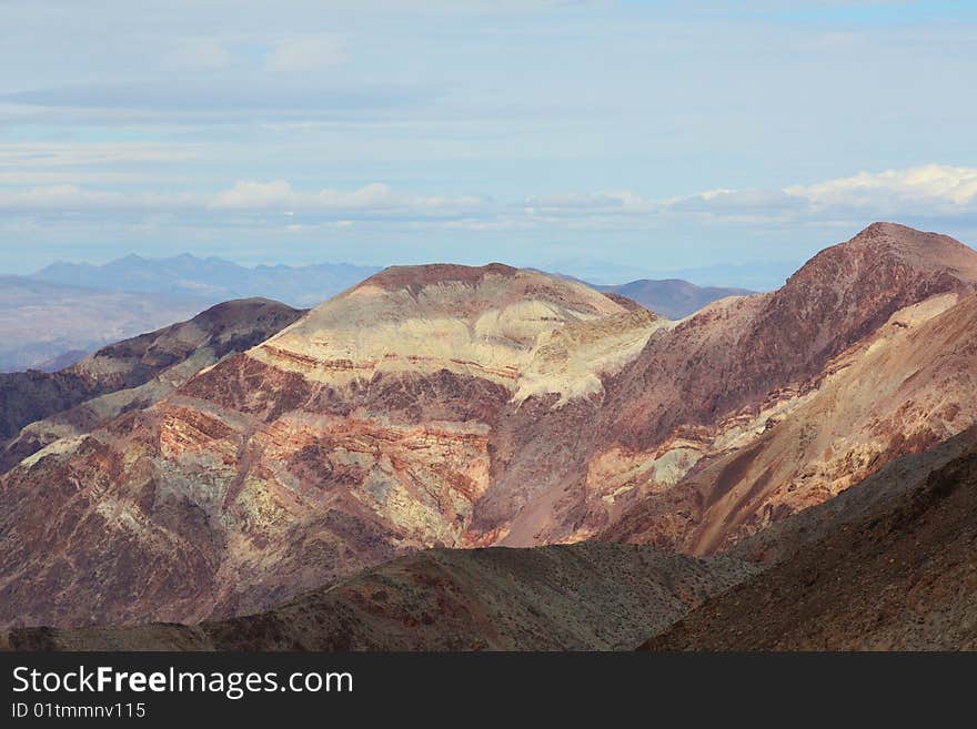 Multi-colored sandston mountains in the desert