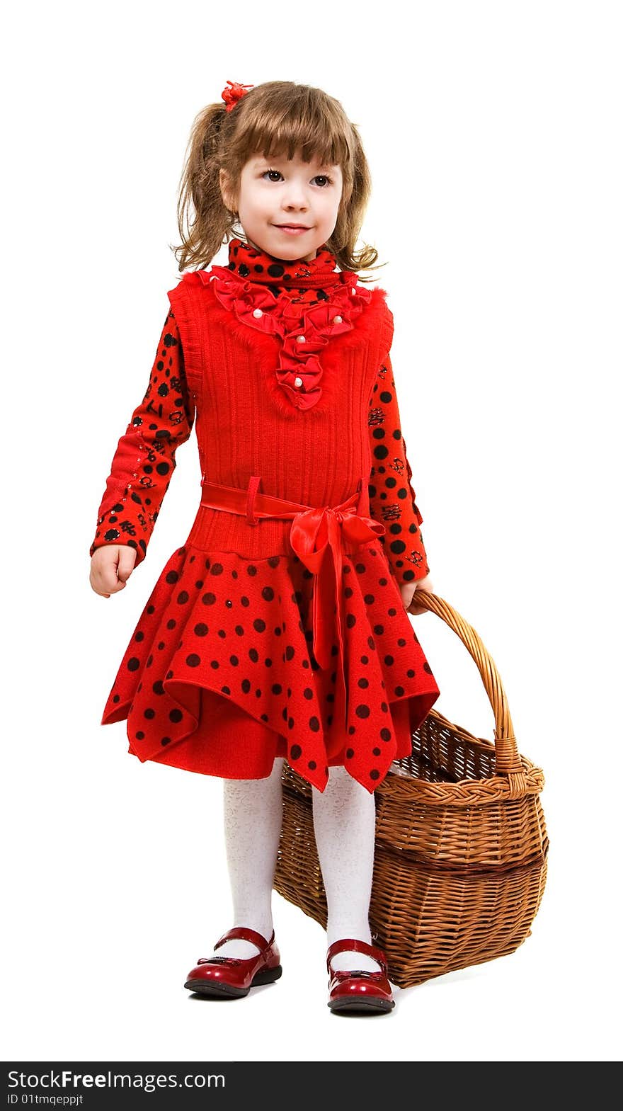 Beautiful little girl in red dress holding basket, isolated on white