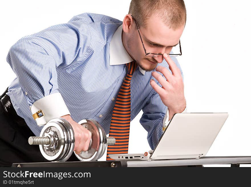 Businessman lifting dumbell with laptop. Businessman lifting dumbell with laptop