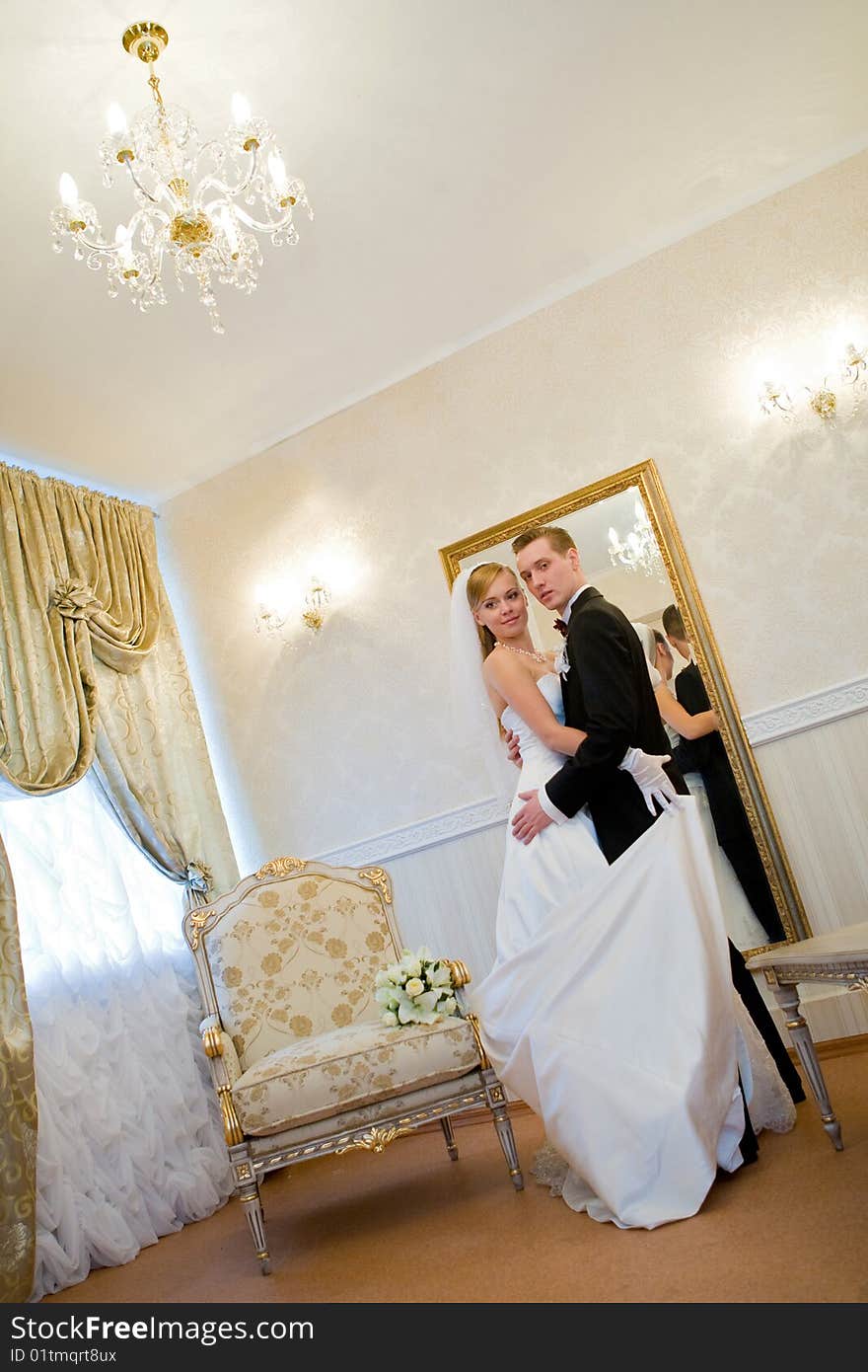 Bride and groom in luxury interior. Bride and groom in luxury interior