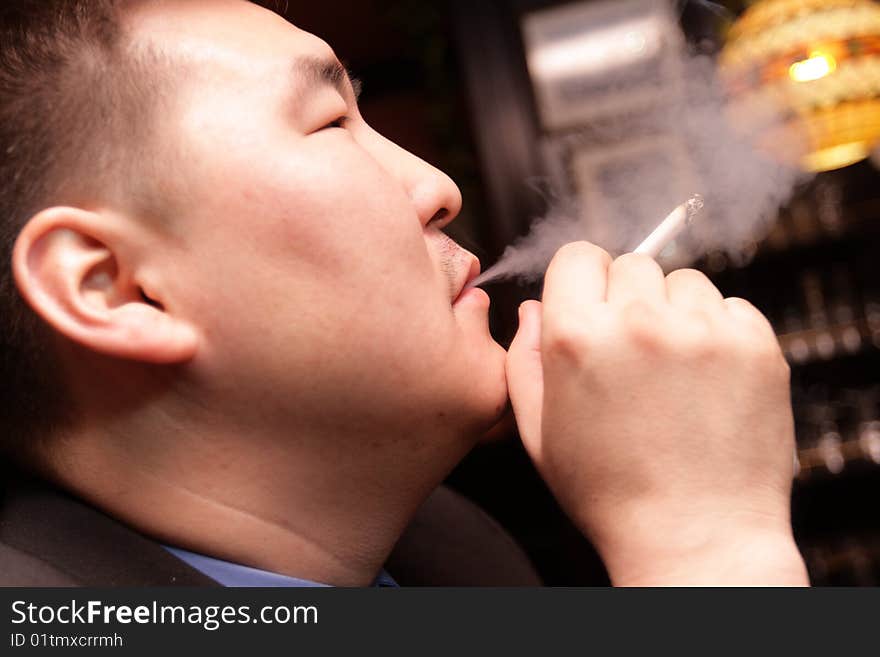 Man smoking in bar