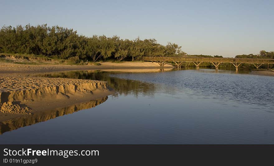 Landscape of river mouth just after sunrise with bridge. Landscape of river mouth just after sunrise with bridge