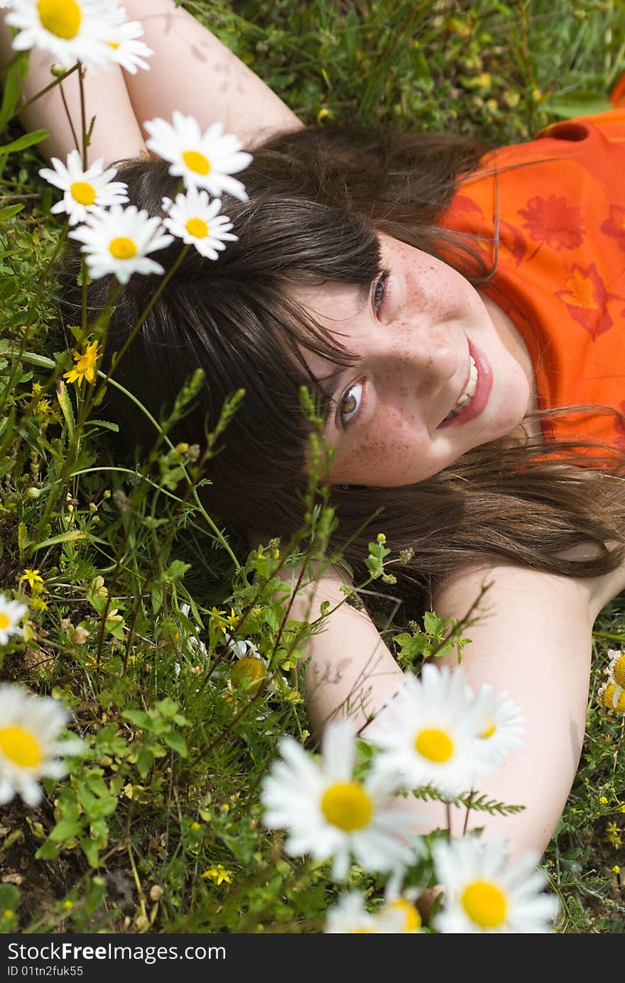 The portrait of girl in the middle of flower. The portrait of girl in the middle of flower