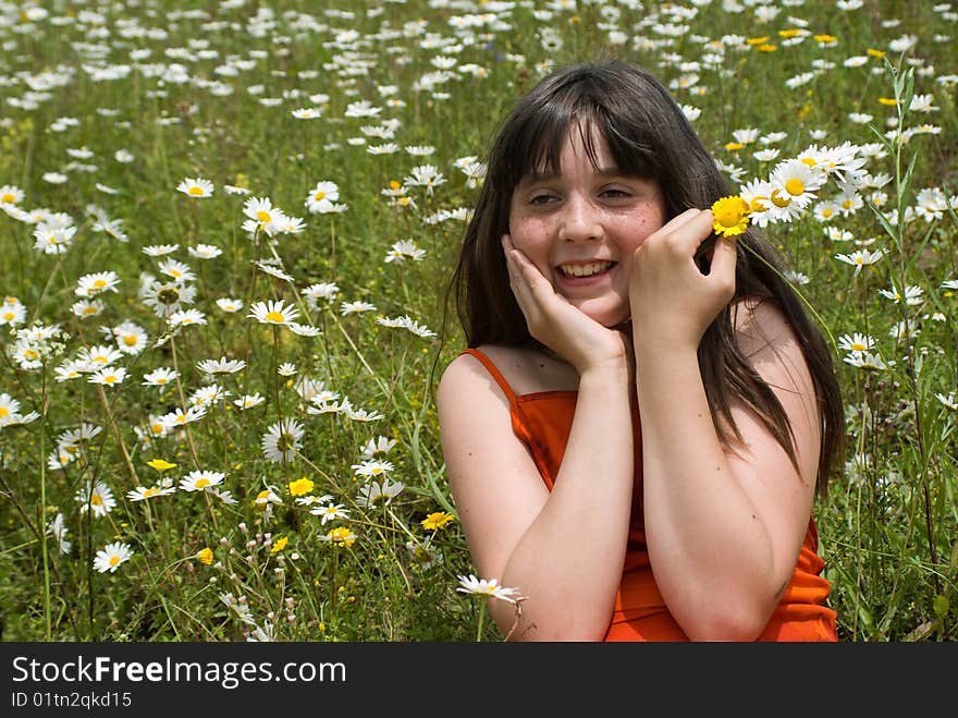 The portrait  of girl in the middle of flower