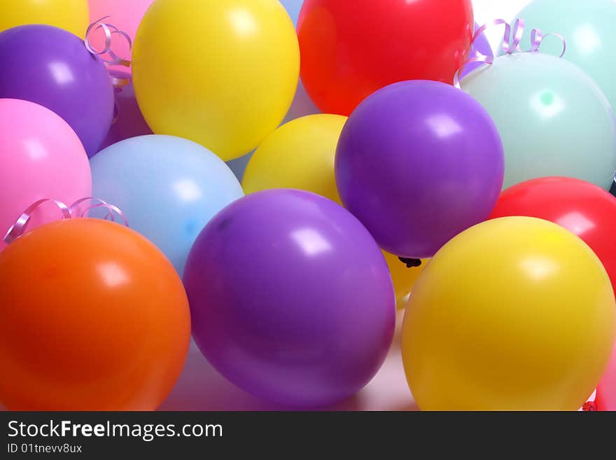 A bunch of colorful balloons that can be used as a background