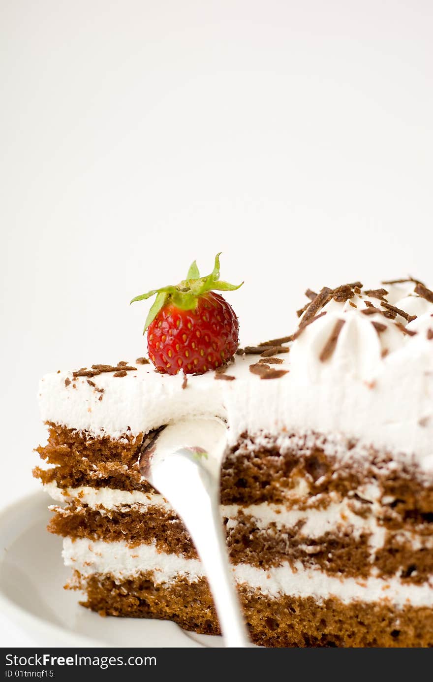 Cake on plate with strawberry