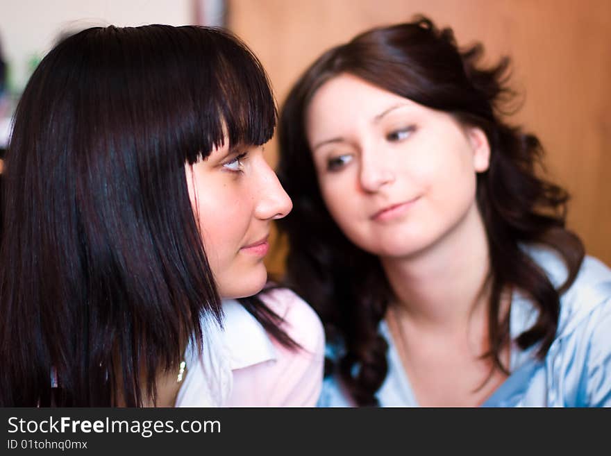 Two beautiful smiling friends girls. Two beautiful smiling friends girls