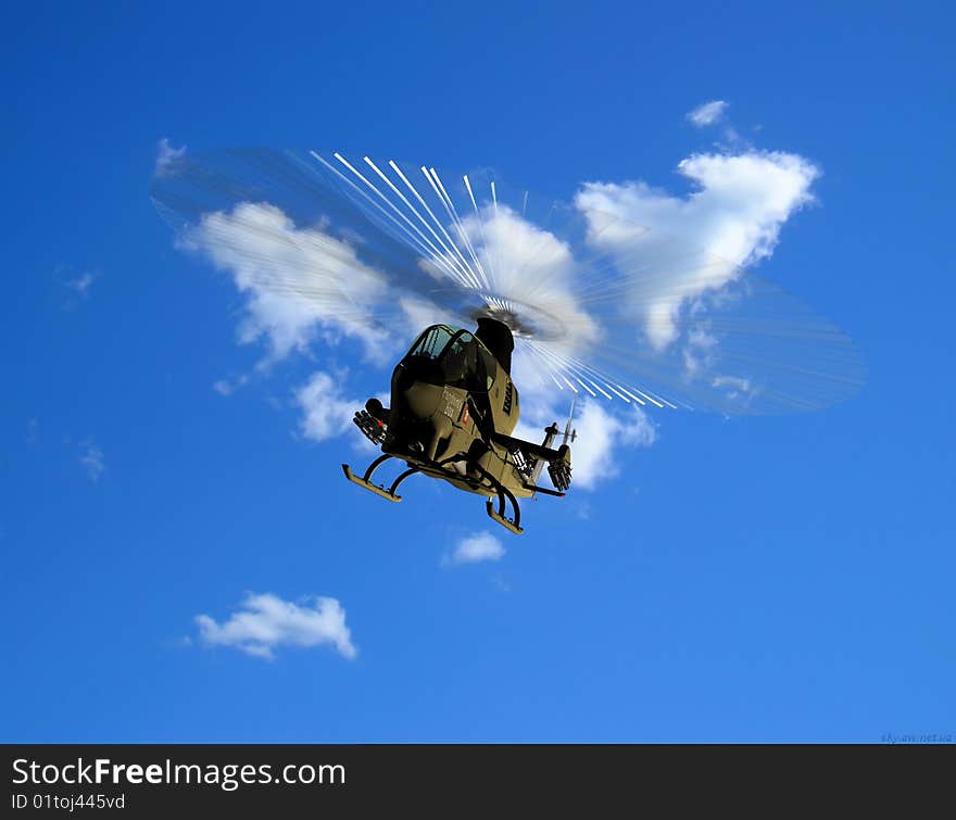 Military helicopter on a background sky