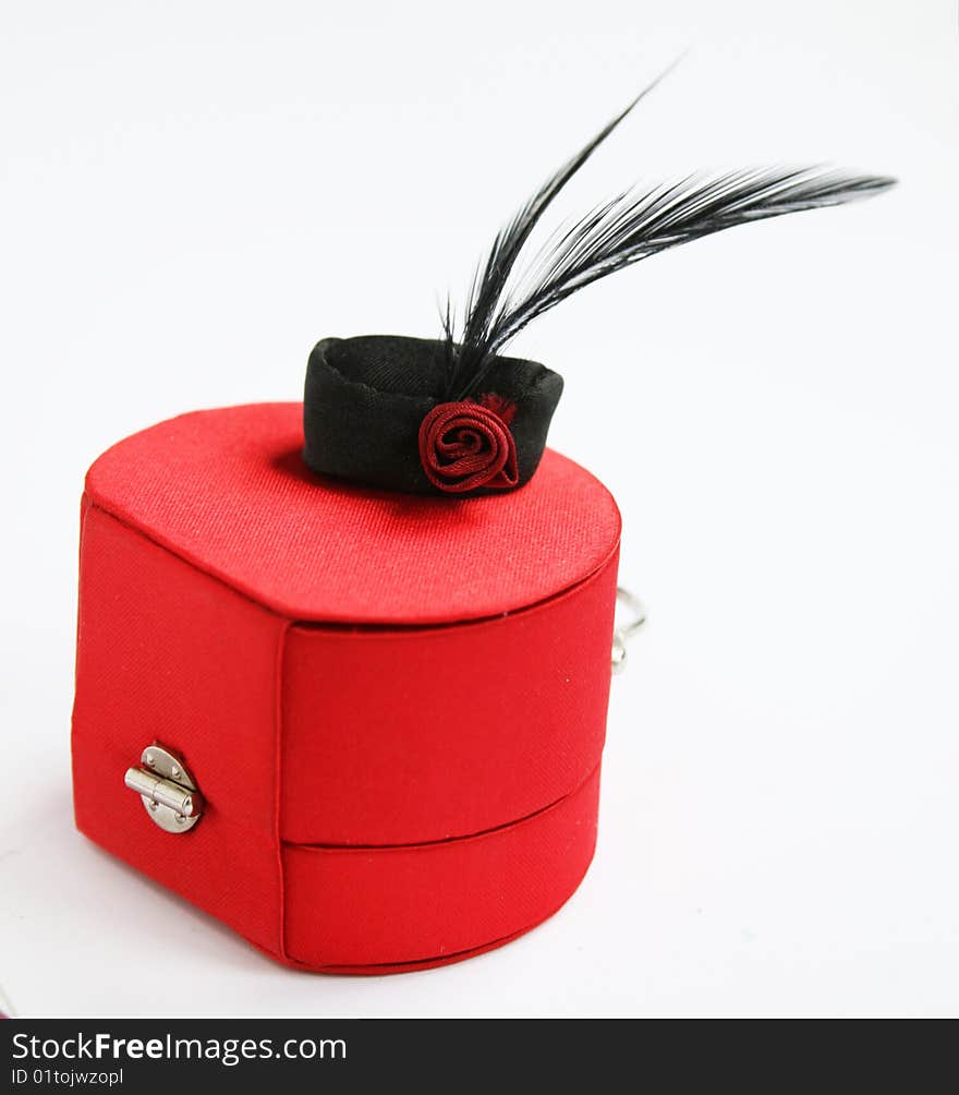 Vintage hat with Feather and rose on retro bag. Vintage hat with Feather and rose on retro bag