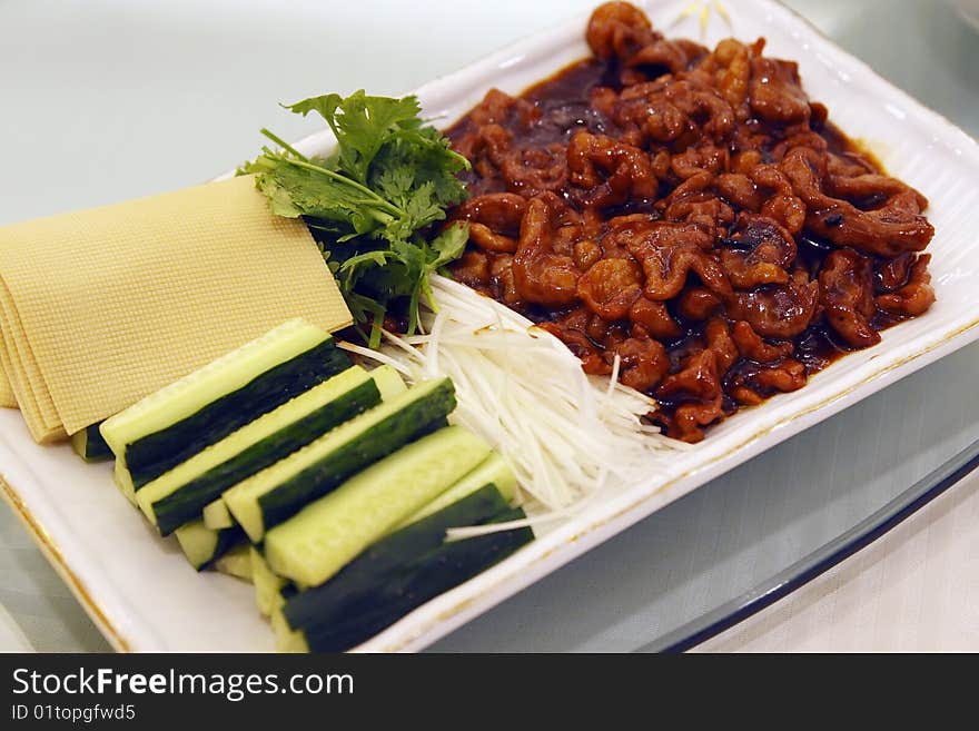 Sauced shredded meat in Beijing, it is a very famous cooked food in Beijing. Sauced shredded meat in Beijing, it is a very famous cooked food in Beijing.