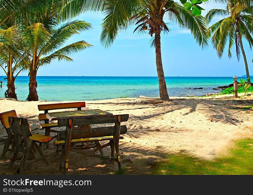 Table and bench on the beach. Table and bench on the beach