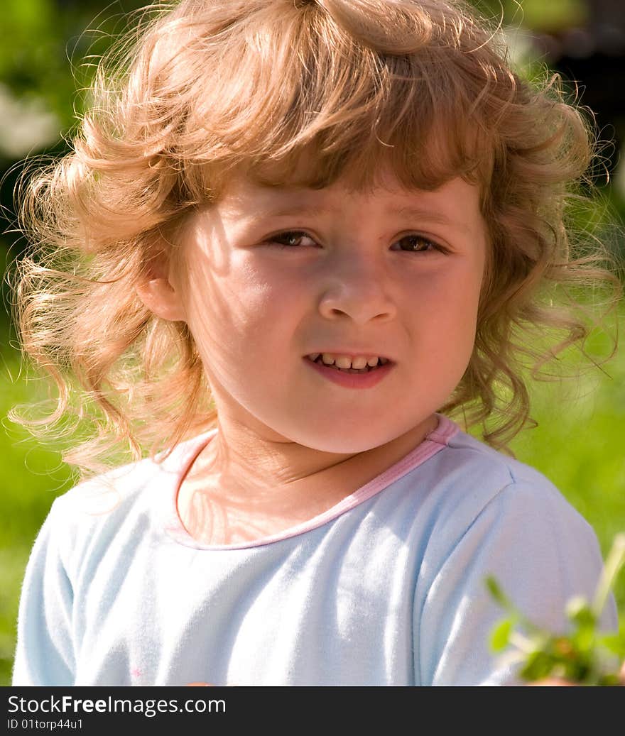 Little girl in the garden