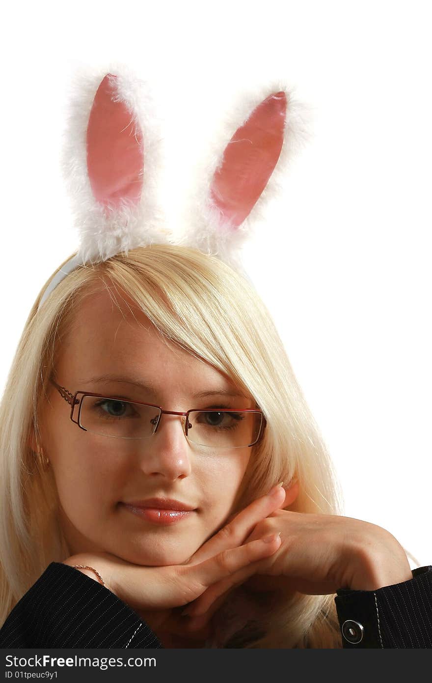 A young attractive business woman with bunny ears, isolated on white background