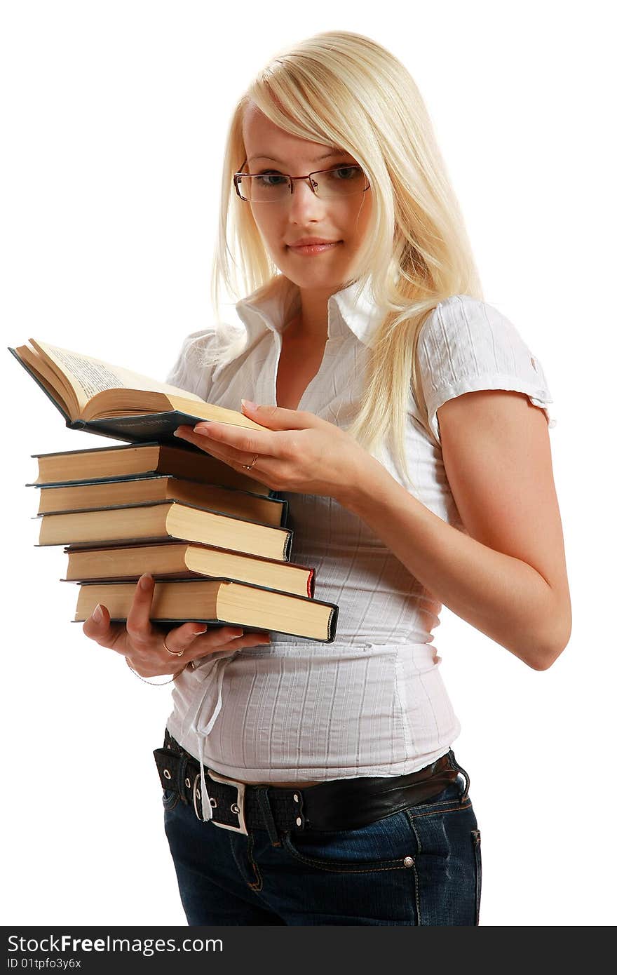 Young Girl Leaned Over Pile Of Books