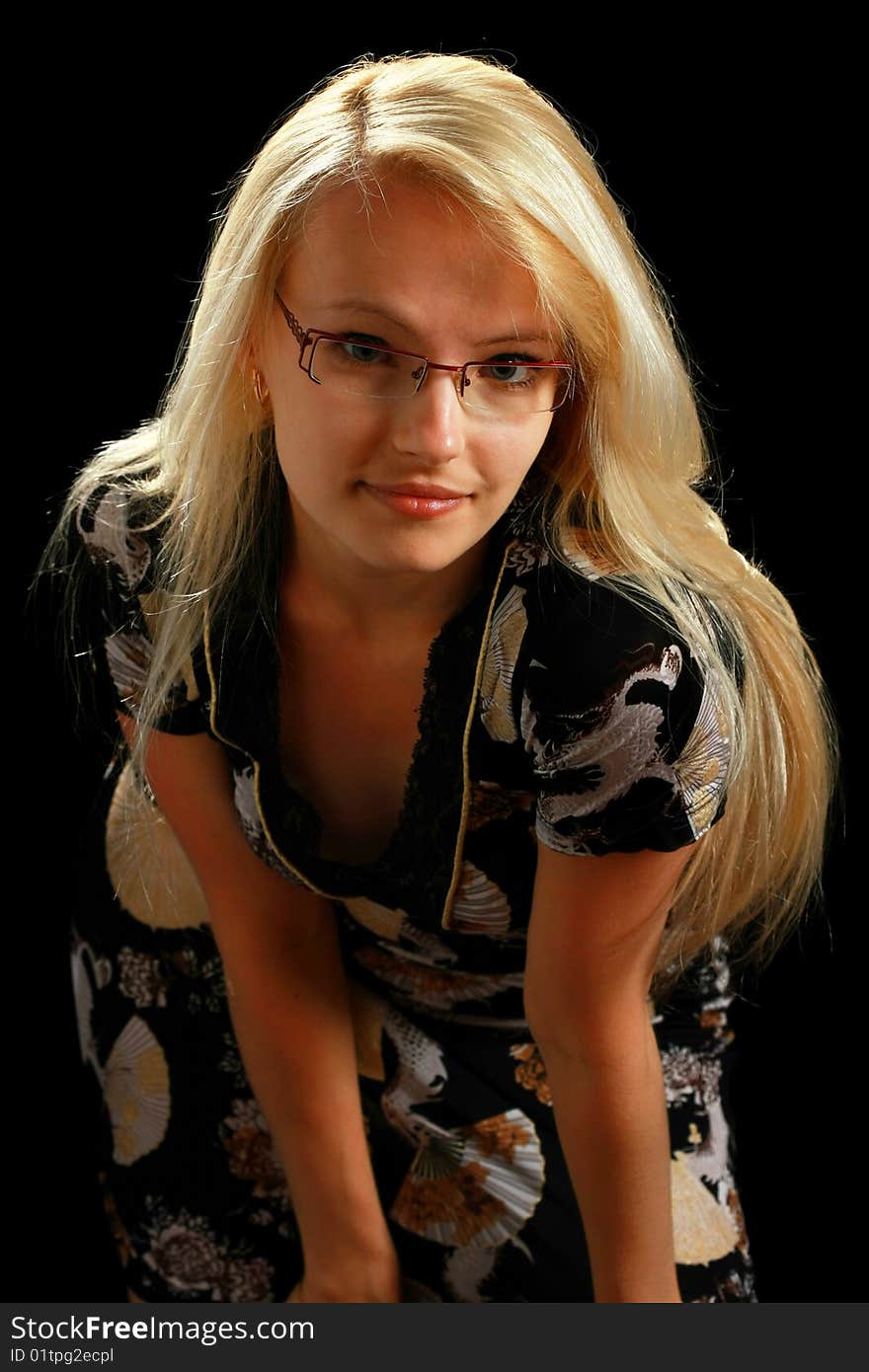 A young attractive woman, isolated on black background