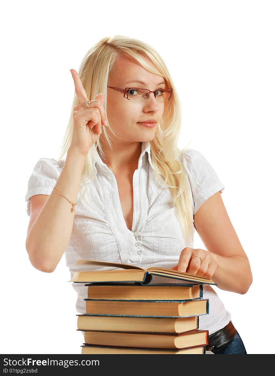 Young woman picking out several books for pleasure reading, isolated on white background. Young woman picking out several books for pleasure reading, isolated on white background