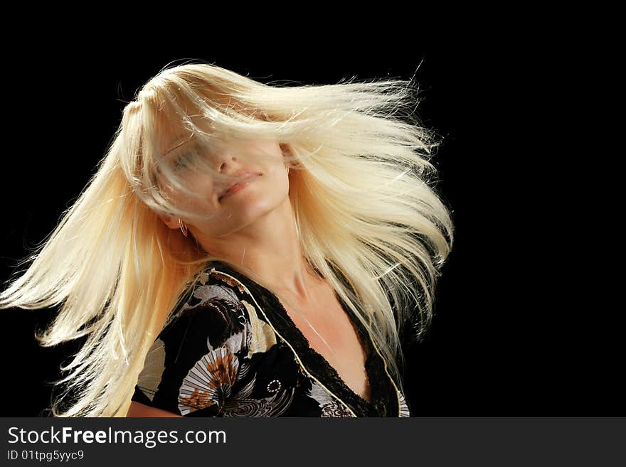 A young attractive woman, isolated on black background