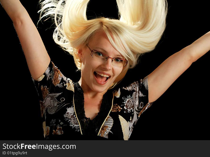 A young attractive woman, isolated on black background