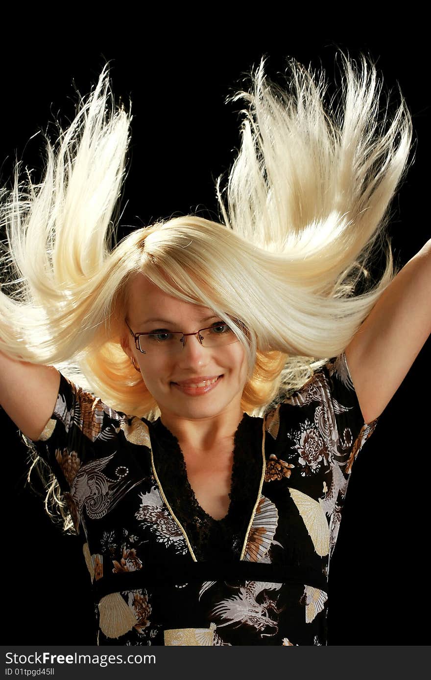 A young attractive woman, isolated on black background