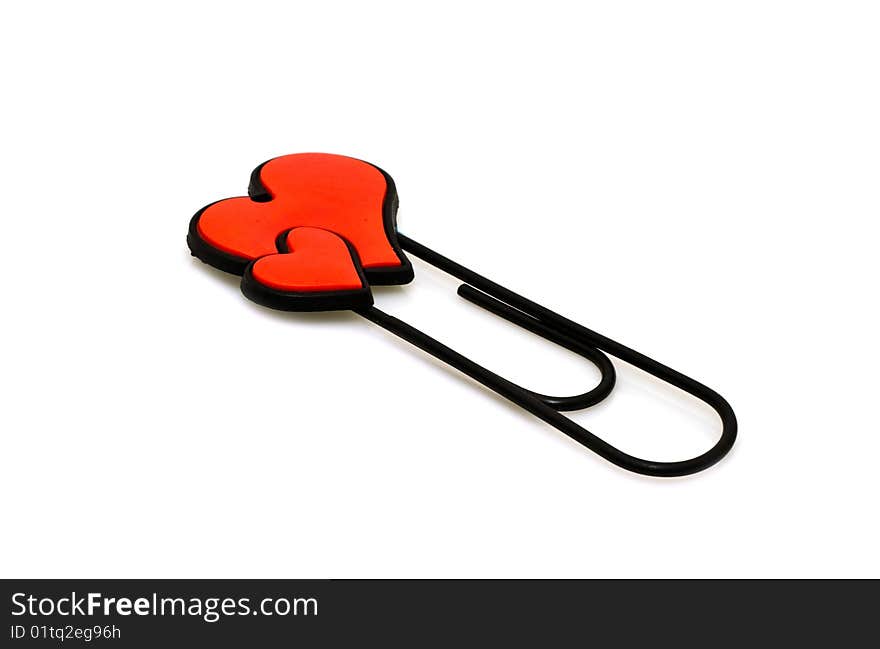 Paper clip with hearts on a white background