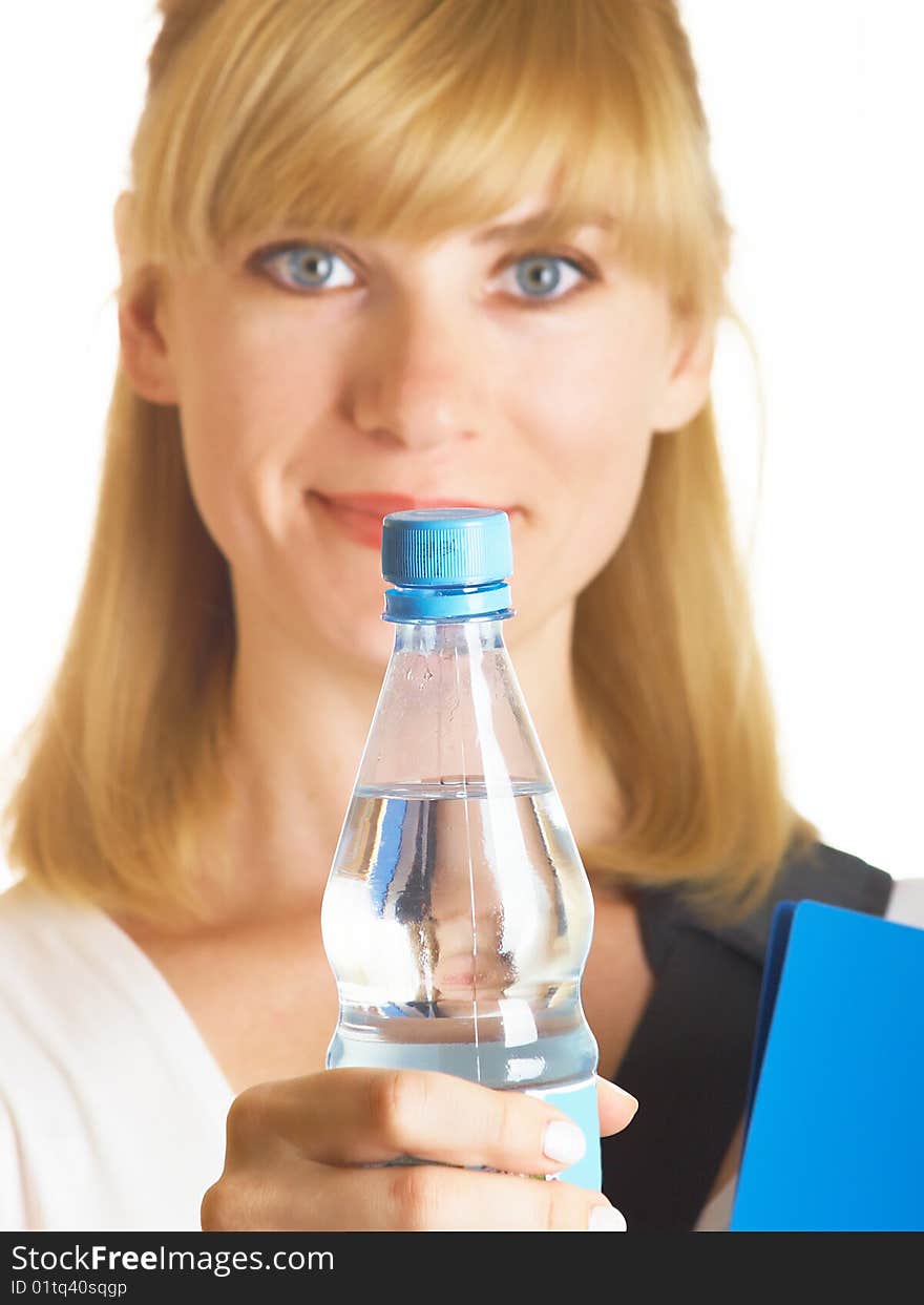 It holds a bottle with water on the white background. It holds a bottle with water on the white background