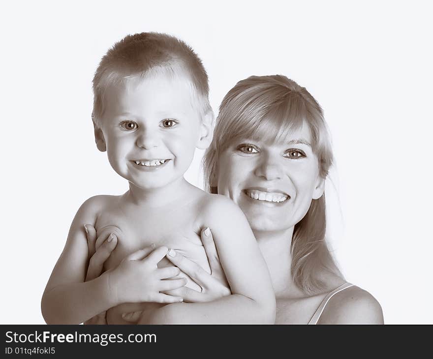 Young mum with the small son on a white background. Young mum with the small son on a white background