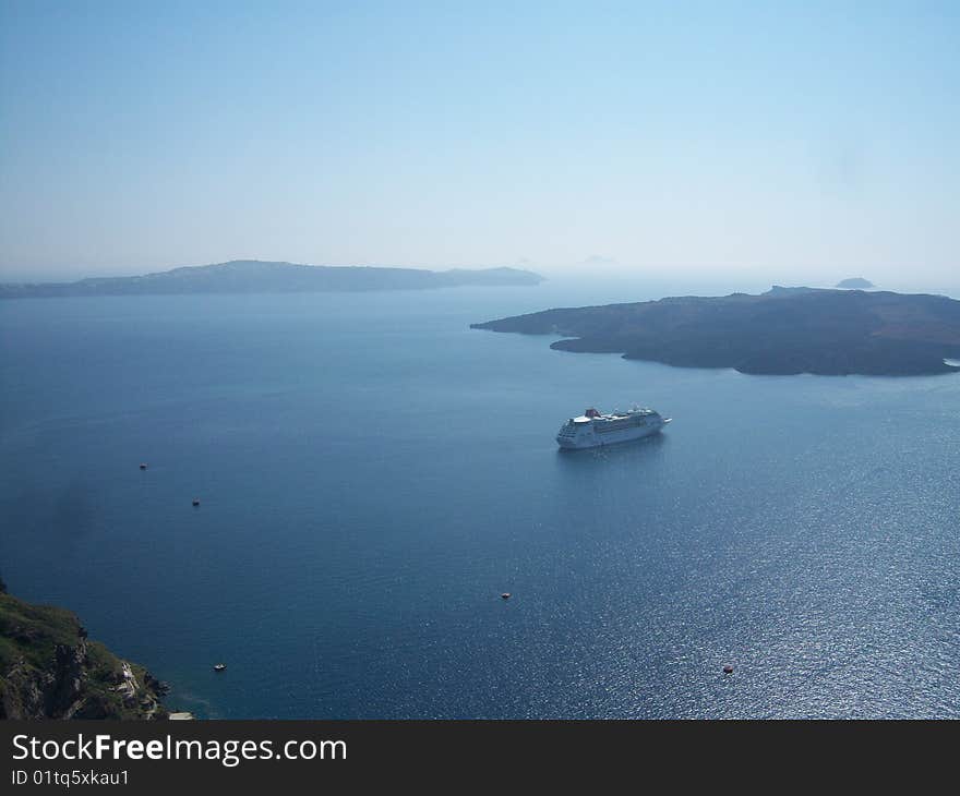 Greek island of Santorini and cruiser