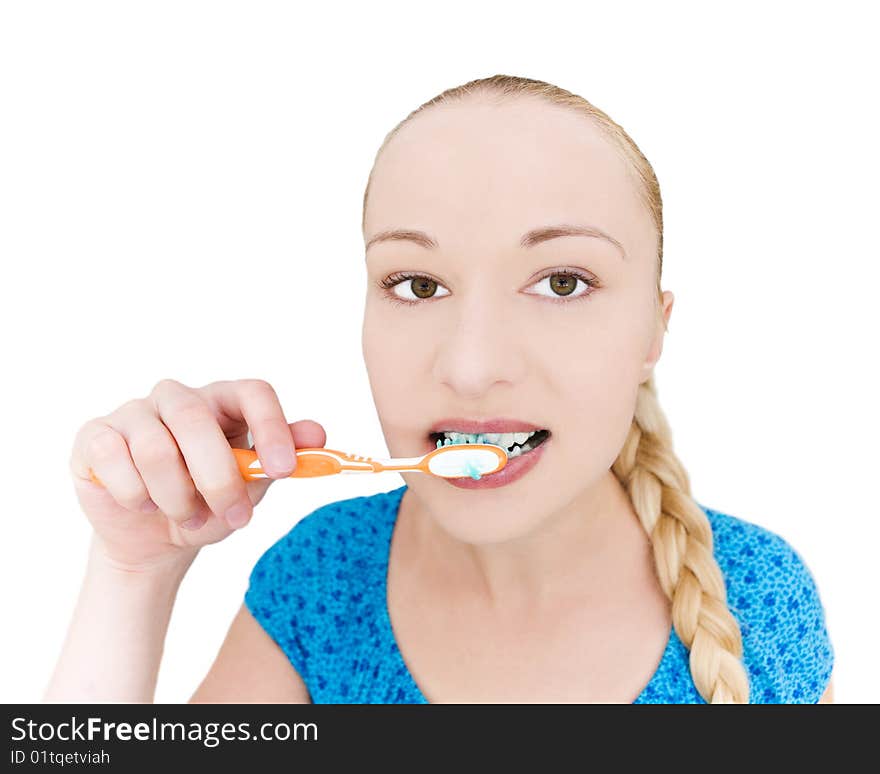 Beautiful young girl brushing teeth - on white background