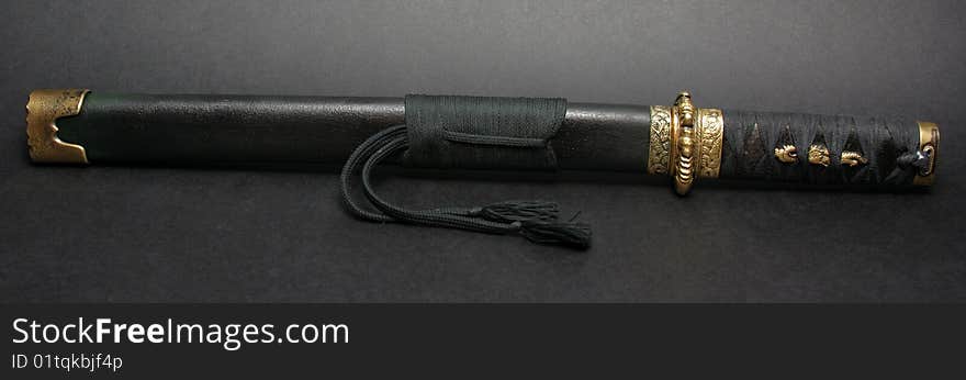 The wakizashi  is a traditional Japanese sword with a blade between 30 and 60 cm (12 and 24 inches), with an average of 50 cm (20 inches). It is similar to but shorter than a katana, and usually shorter than the kodachi (small sword). The wakizashi was usually worn together with the katana by the samurai or swordsmen of feudal Japan.