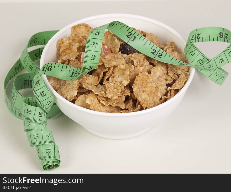 Measurement Tape Wrapped Around Dish With Flakes