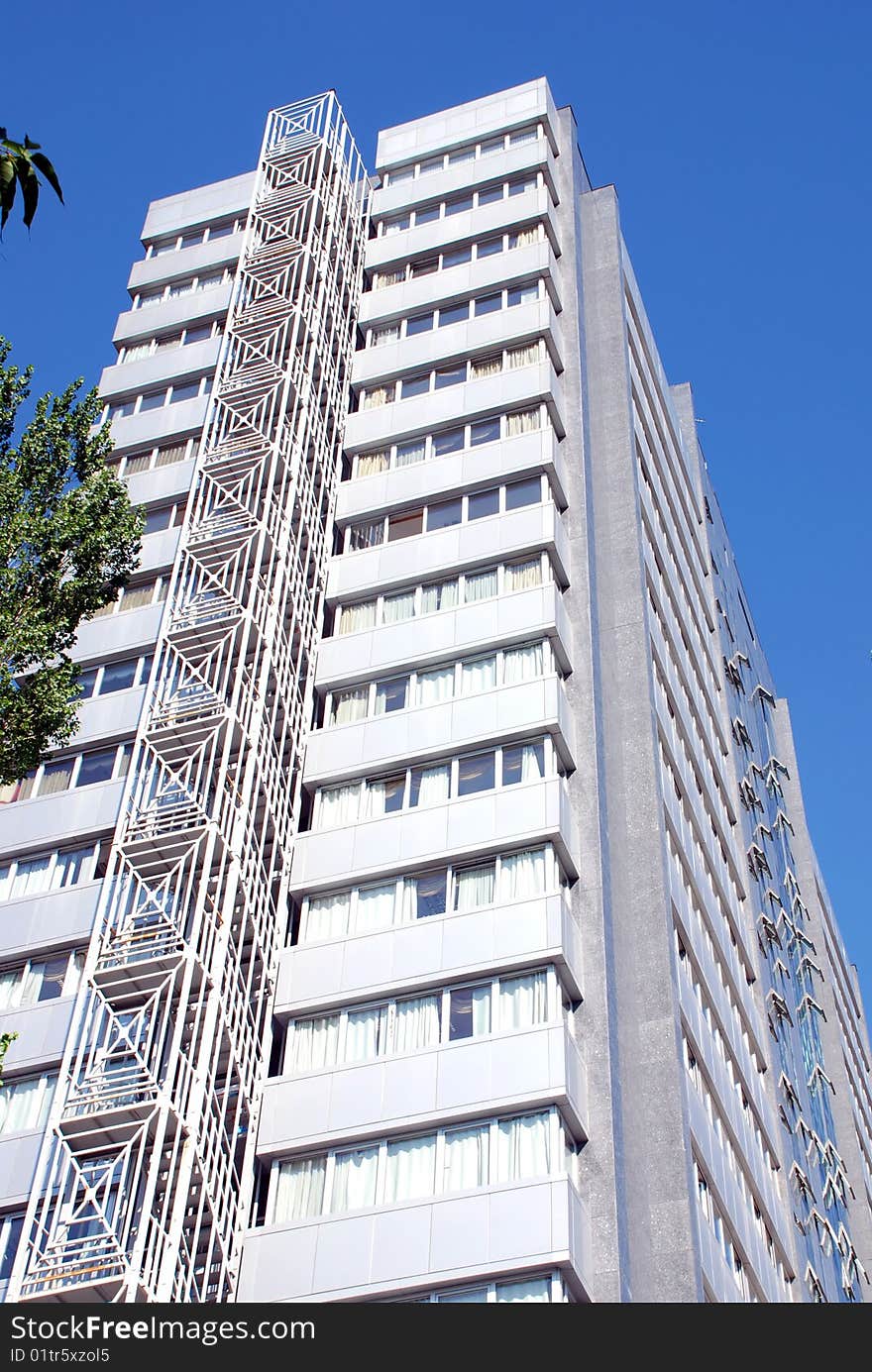 Modern building on the blue sky background