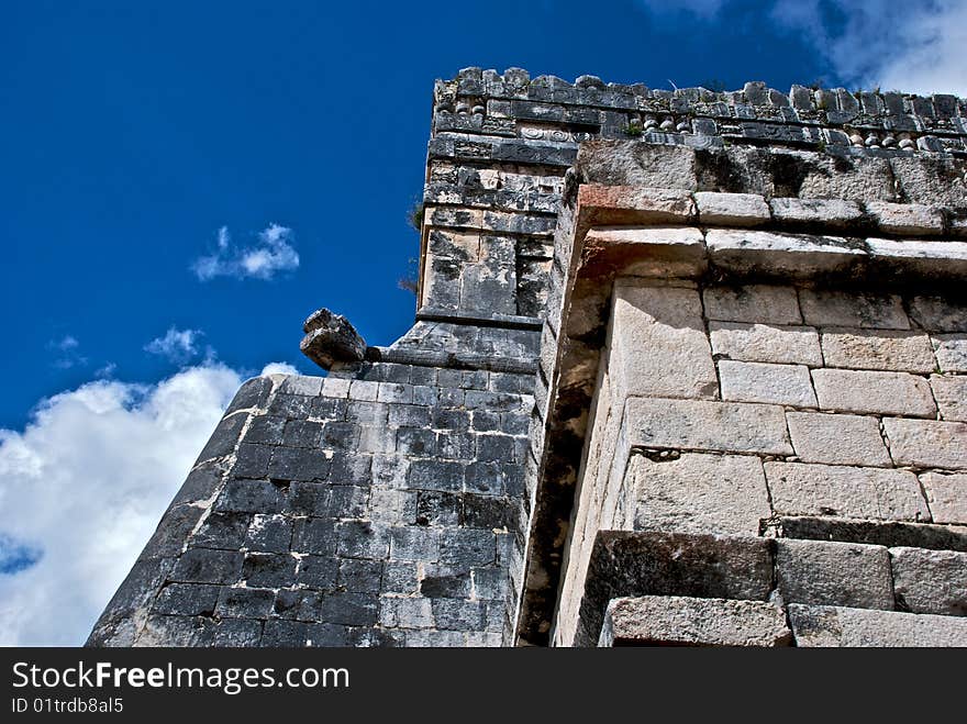 Corner of a small pyramid at Chchen Itza Mexico. Corner of a small pyramid at Chchen Itza Mexico