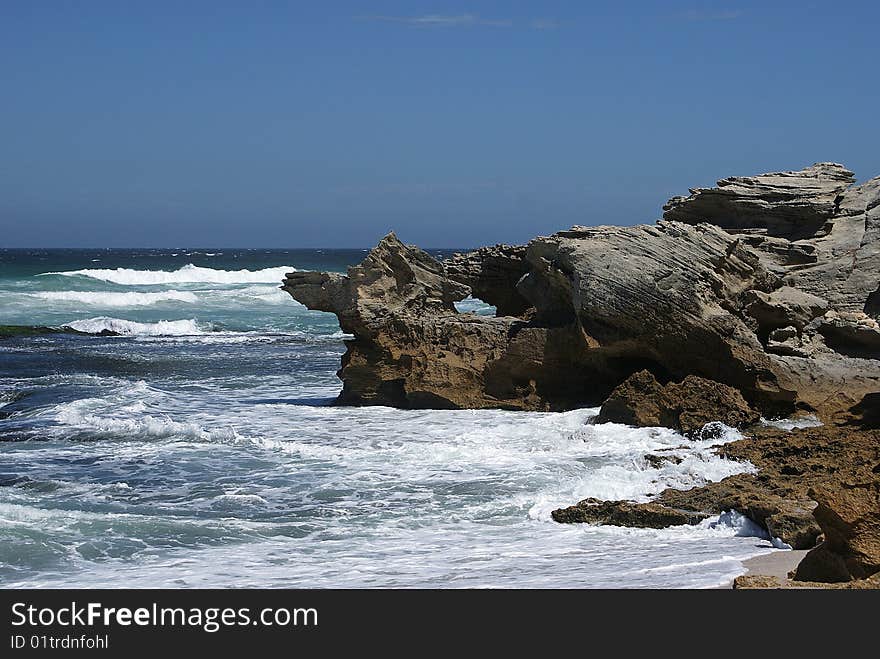 Rocks in the ocean at the South African coast. Rocks in the ocean at the South African coast