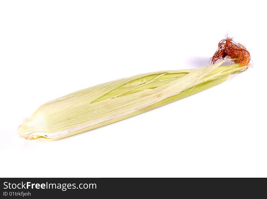 Corn in leaves on a white background