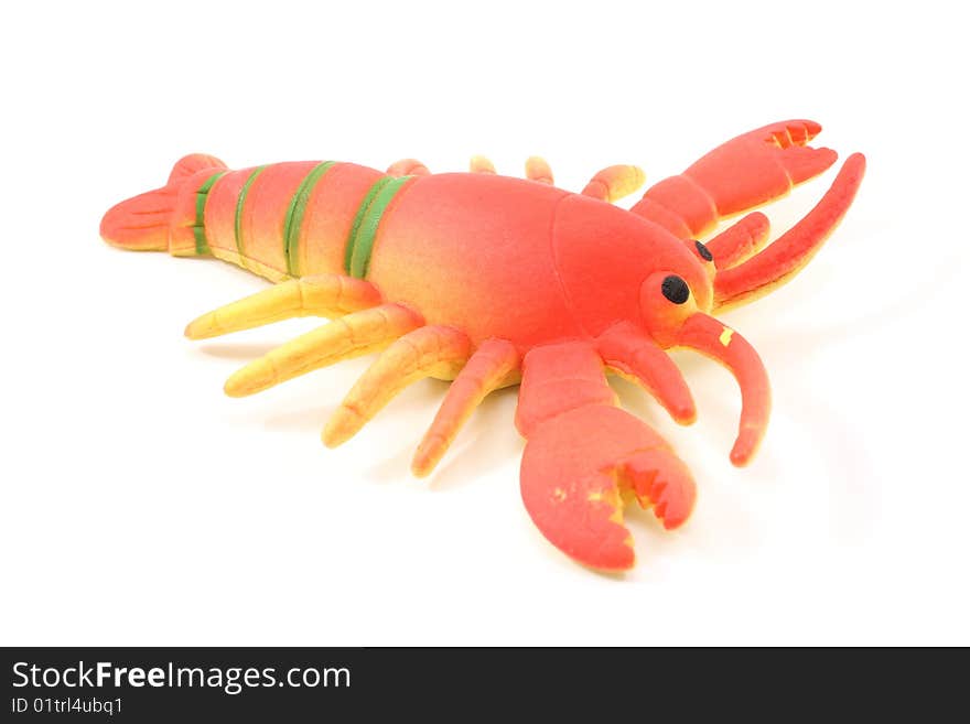 A lobster toy on a white background.