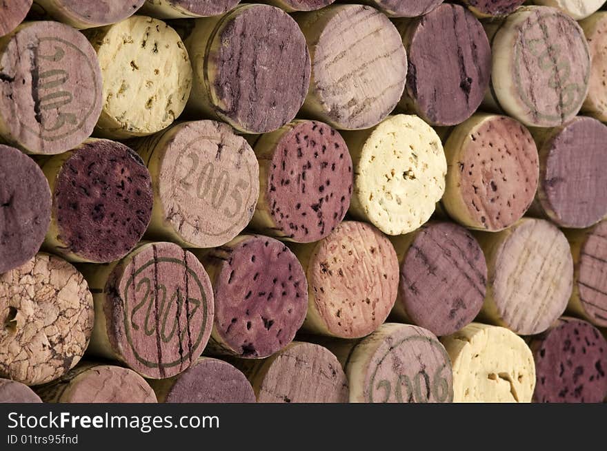 Stack of wine corks, focus on left side, right side recedes. Stack of wine corks, focus on left side, right side recedes.