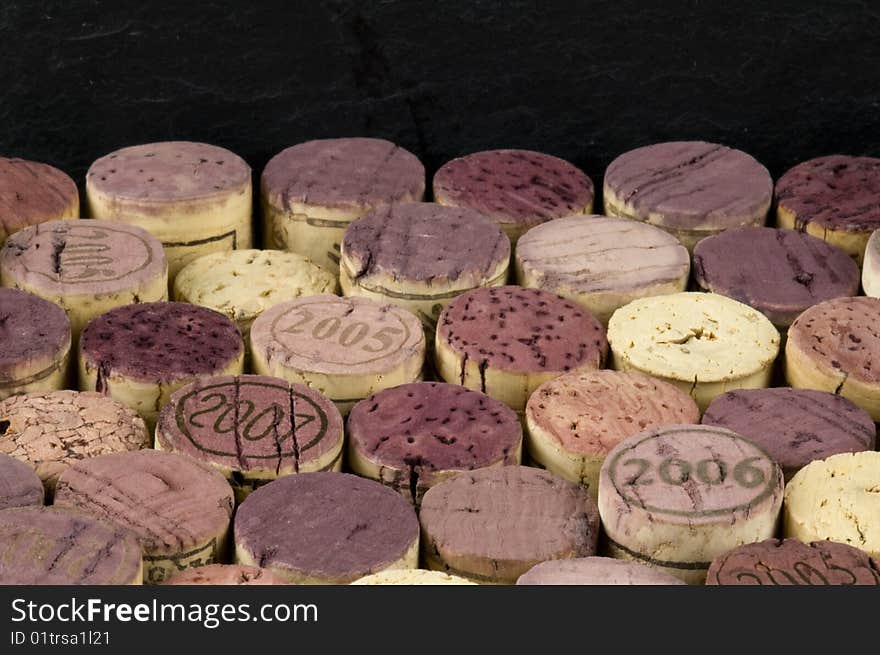 Background, wine corks in lower two thirds, slate in top frame. Background, wine corks in lower two thirds, slate in top frame.