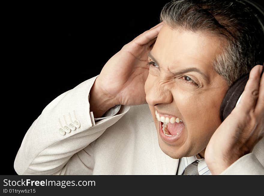 Businessman listening loud music