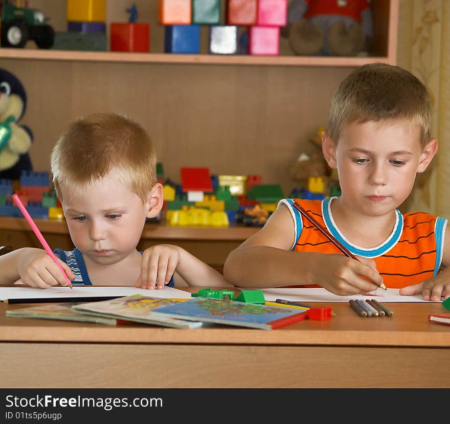 Two boys in a children's room. Two boys in a children's room