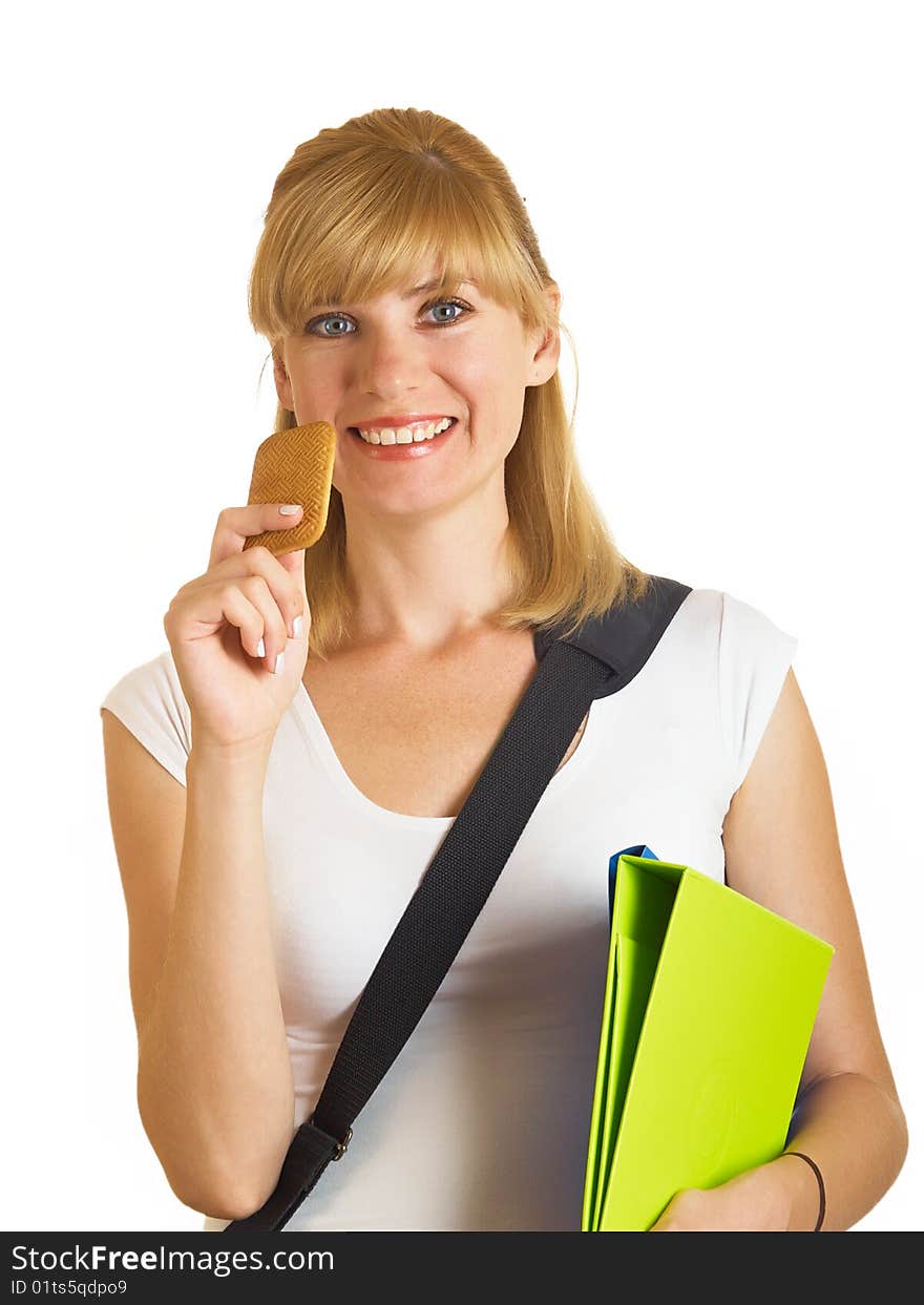 The young student is cookies on a white background. The young student is cookies on a white background