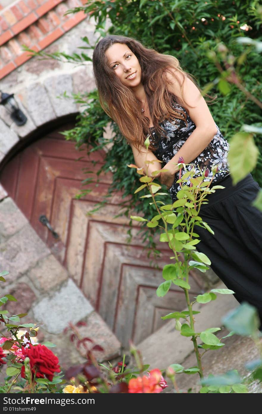 Beautiful young woman in garden