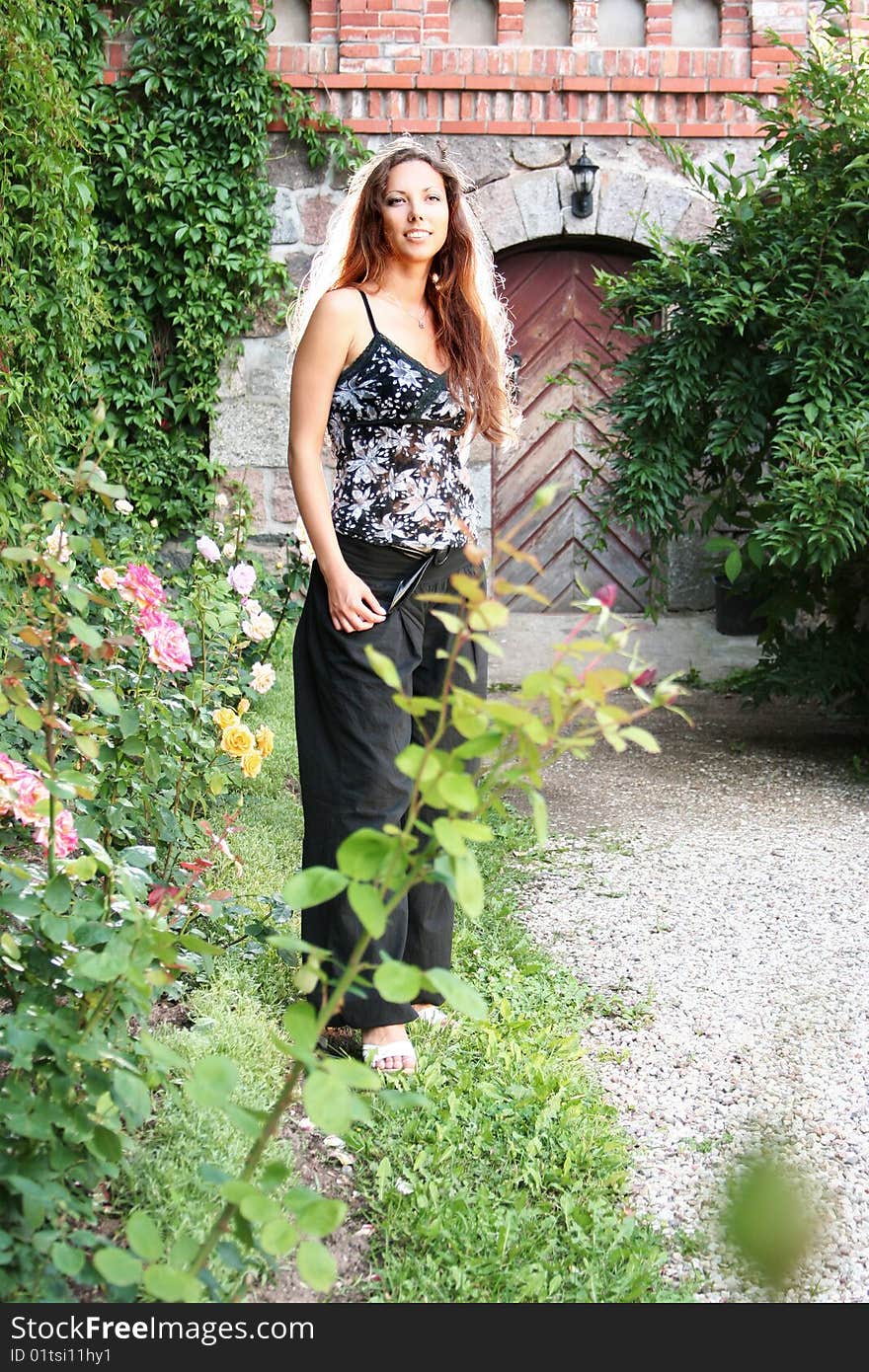 Beautiful young woman in garden. Beautiful young woman in garden