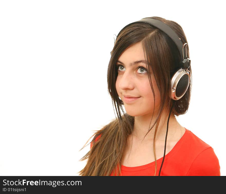 The girl in headphones on a white background