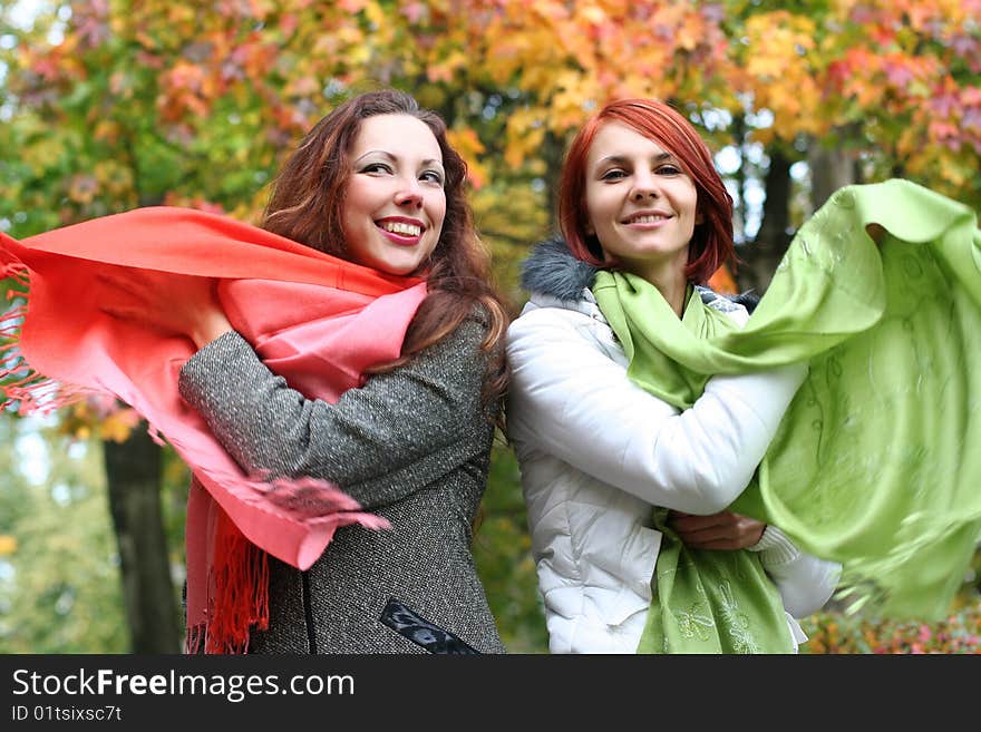 Two young girls having fun in park. Two young girls having fun in park