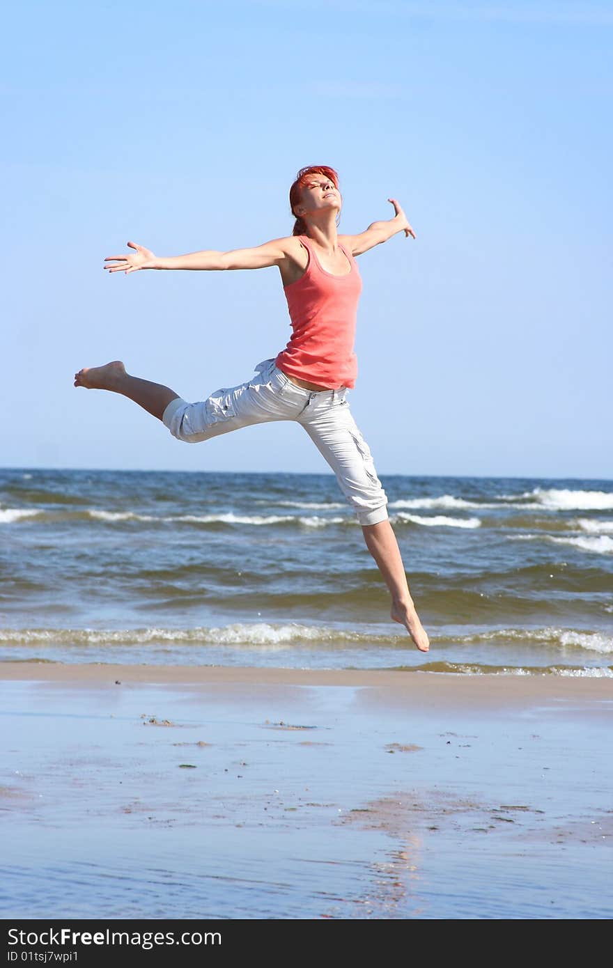 Young woman relaxing on the beach. Young woman relaxing on the beach