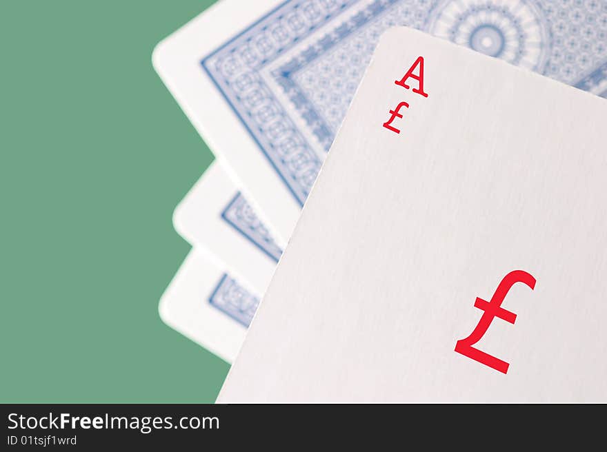 Closeup of playing cards showing Ace of Pounds. Closeup of playing cards showing Ace of Pounds